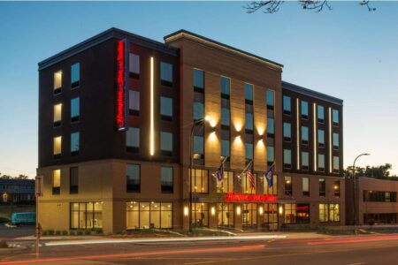 Photo shows the front of the Hampton Inn Minneapolis - University Area hotel.